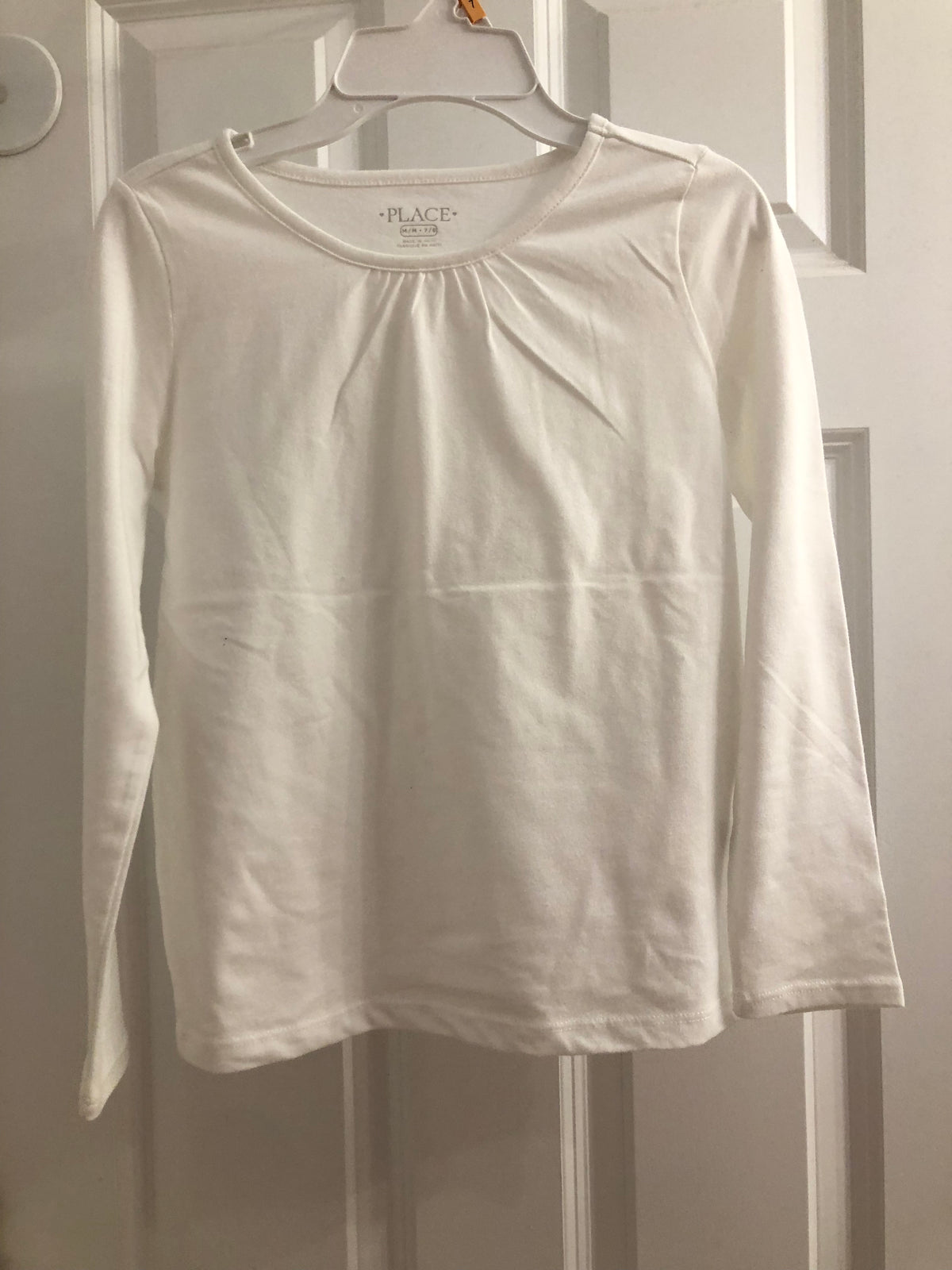 Like new white tee Long sleeve. Cotton - size Youth - 7 (S)