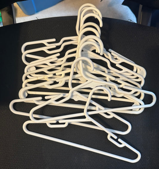 10 white notched hangets Elementary age clothes