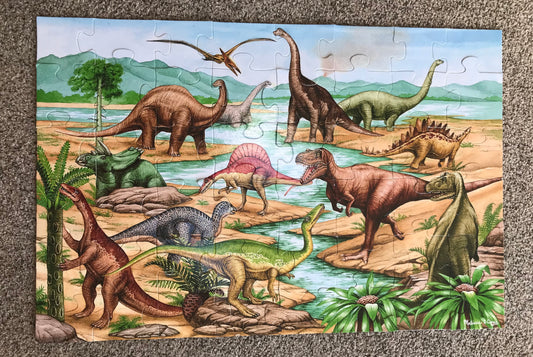 Dinosaur puzzle Pieces excellent cond.