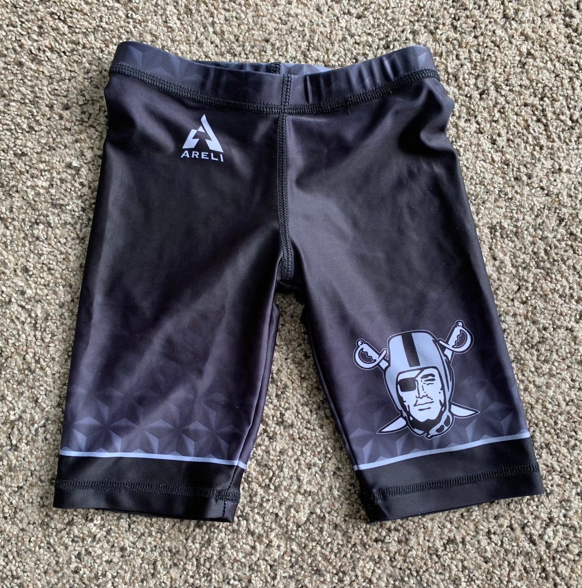 Sports under shorts NWOT Raiders bike shorts - size Youth - 5 (XS)