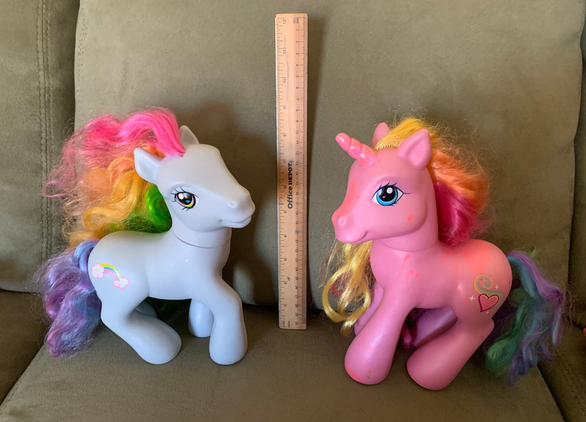 2 large my little pony Pink has marker drawings
