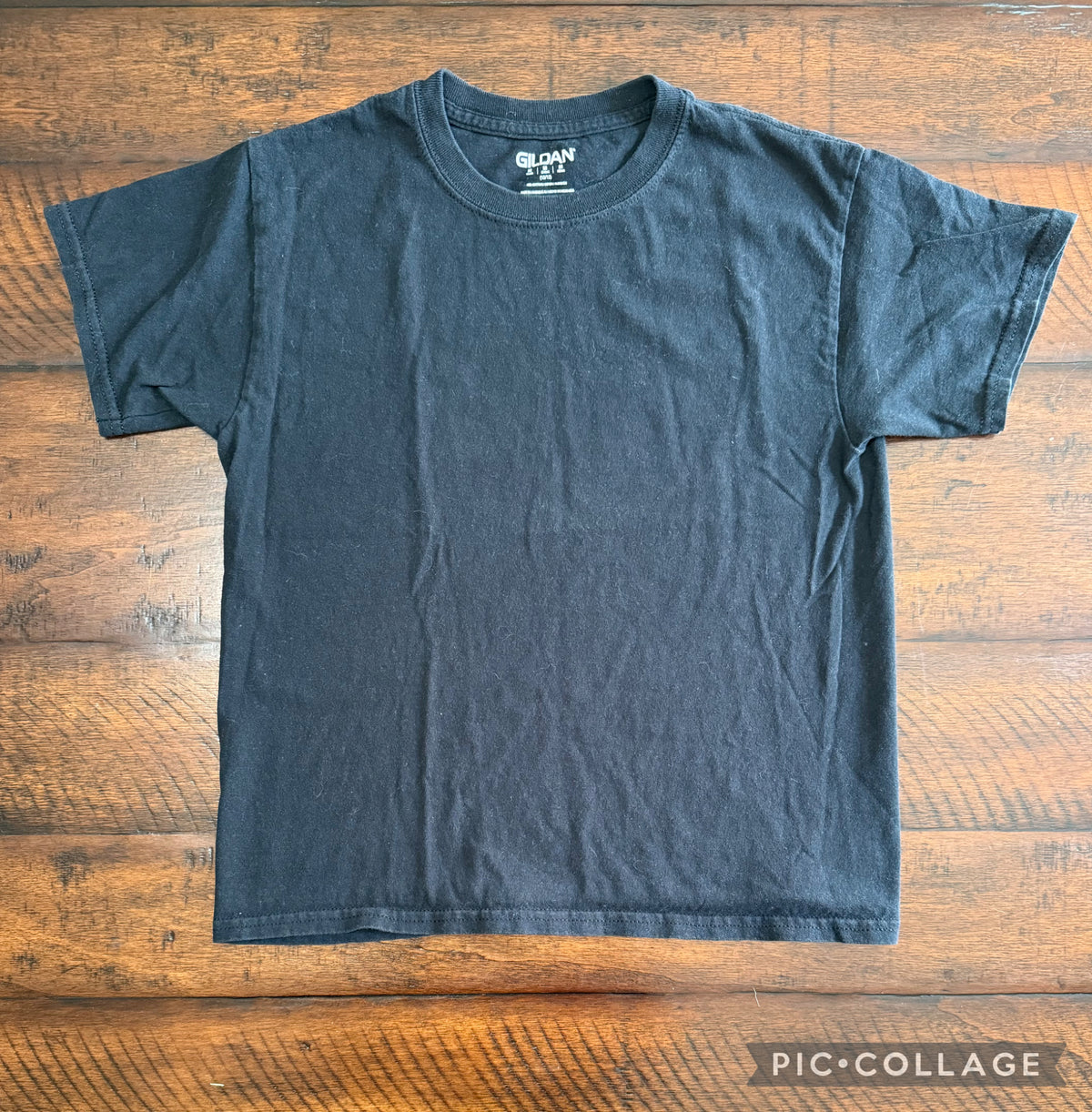 Black short sleeve shirt - size Youth - 10 (L)