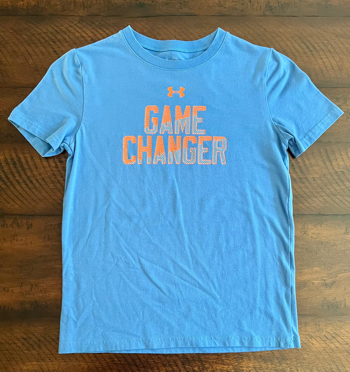 Under Armour blue top -GAME CHANGER in orange - size Youth - 10 (L)