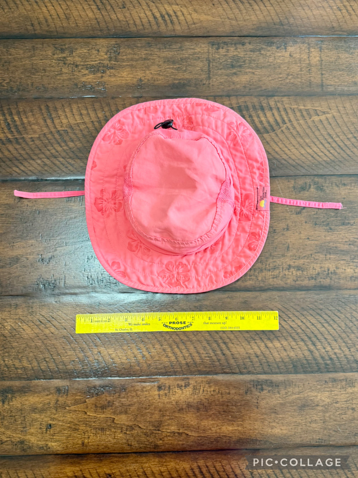 Pink UVA adjustable hat -strap under chin