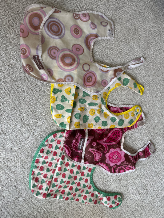 Set of 4 bibs Play condition, clean