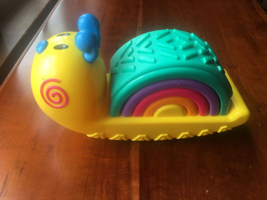 Stacking rainbow snail rocks and rattles