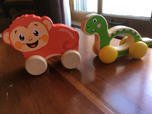 2 wooden wheeled monkey, dino